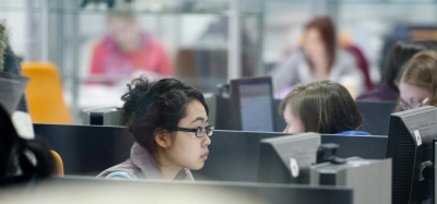 Student looking at computer