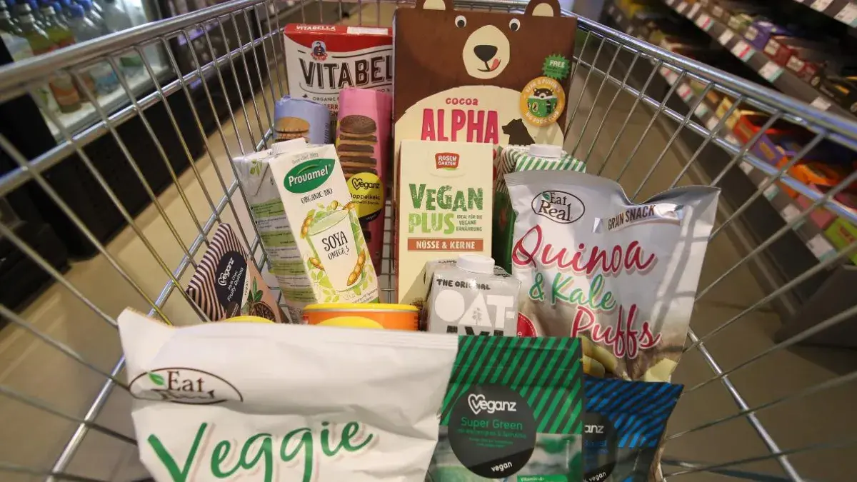 Shopping trolley full of vegan and vegetarian food