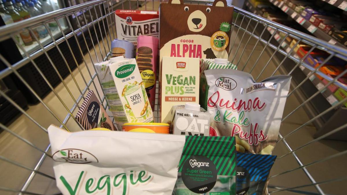 Shopping trolley full of vegan and vegetarian food