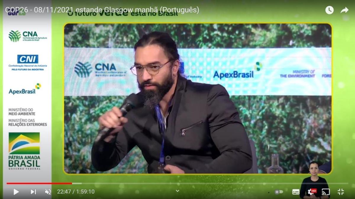 Screenshot of a YouTube video showing Dr Rafael De Oliveira Silva presenting at COP26 in 2021