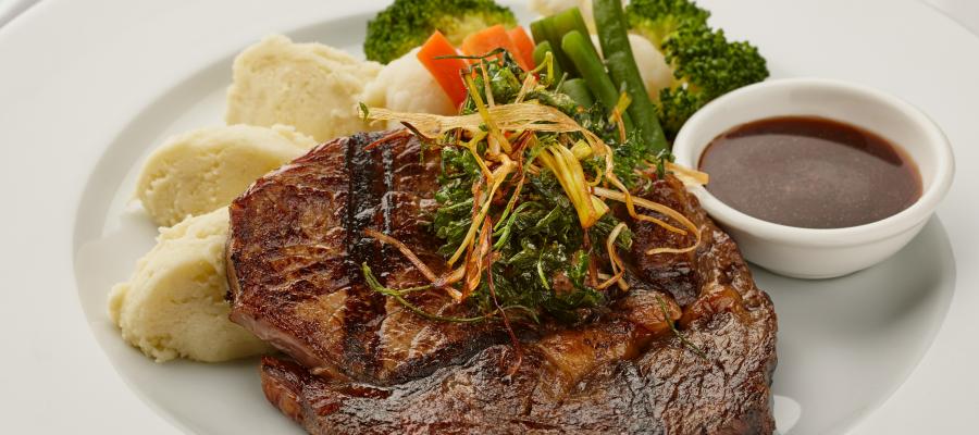 A plate with meat and vegies