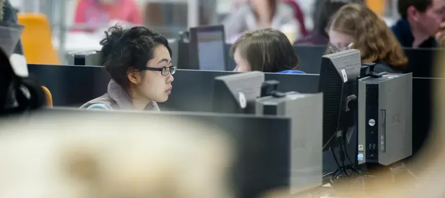 Students at computers in the vet library