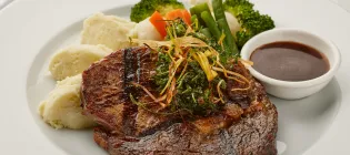 A plate with meat and vegies
