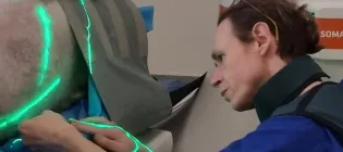 Dr Mark Gray works with the CT scanner at the Large Animal Research and Imaging Facility