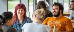 happy vet students interacting in the cafe