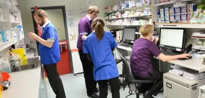 Staff working in pharmacy