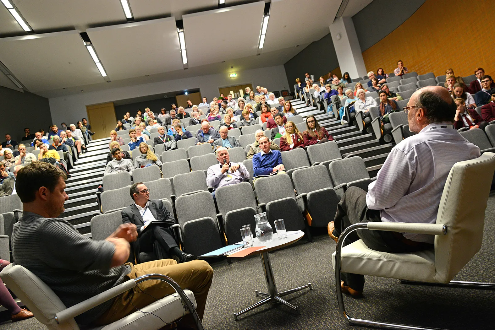 The audience posing questions to our experts