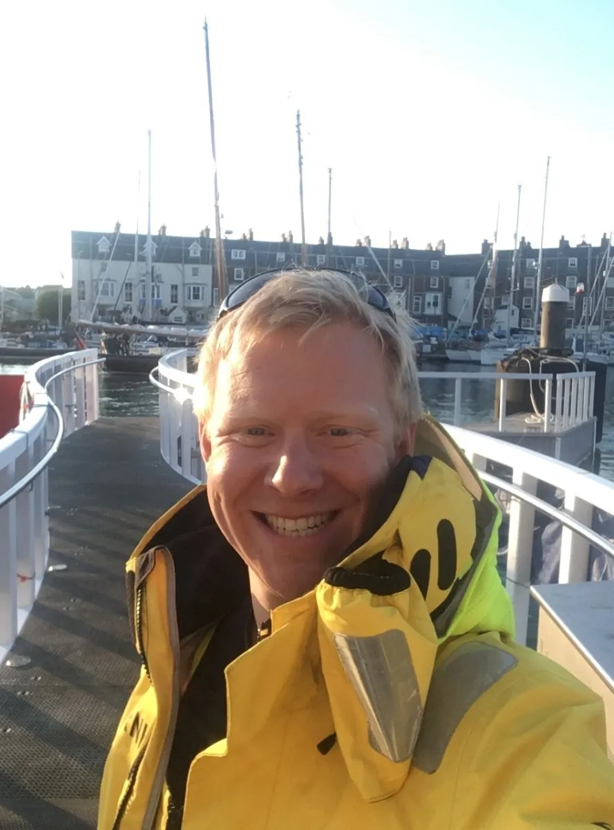 Tim Bean by the shore in town