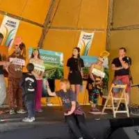 The team and their stall at Glastonbury.