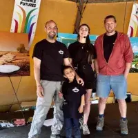 The team and their stall at Glastonbury.