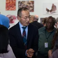 Prof Shinya Yamanaka greeting guests during the drinks reception