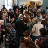 Crowd of people at the drinks reception 