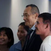Prof Shinya Yamanaka greeting guests during the drinks reception