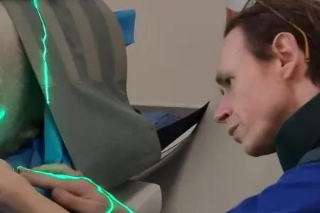 Dr Mark Gray works with the CT scanner at the Large Animal Research and Imaging Facility