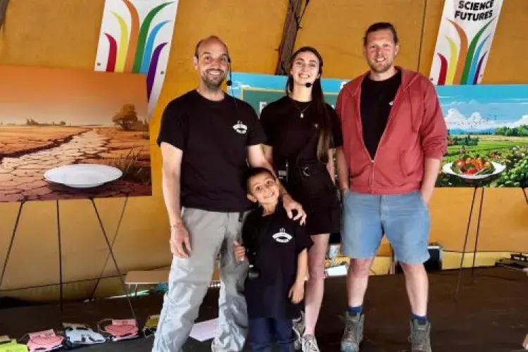 The team and their stall at Glastonbury.