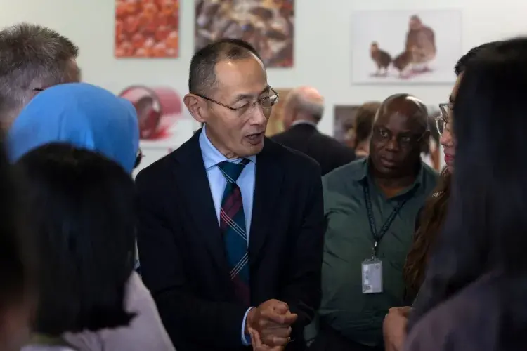 Prof Shinya Yamanaka greeting guests during the drinks reception