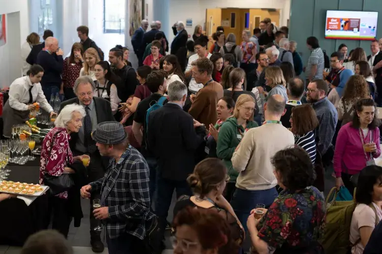 Crowd of people at the drinks reception 