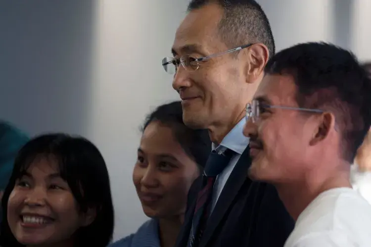 Prof Shinya Yamanaka greeting guests during the drinks reception