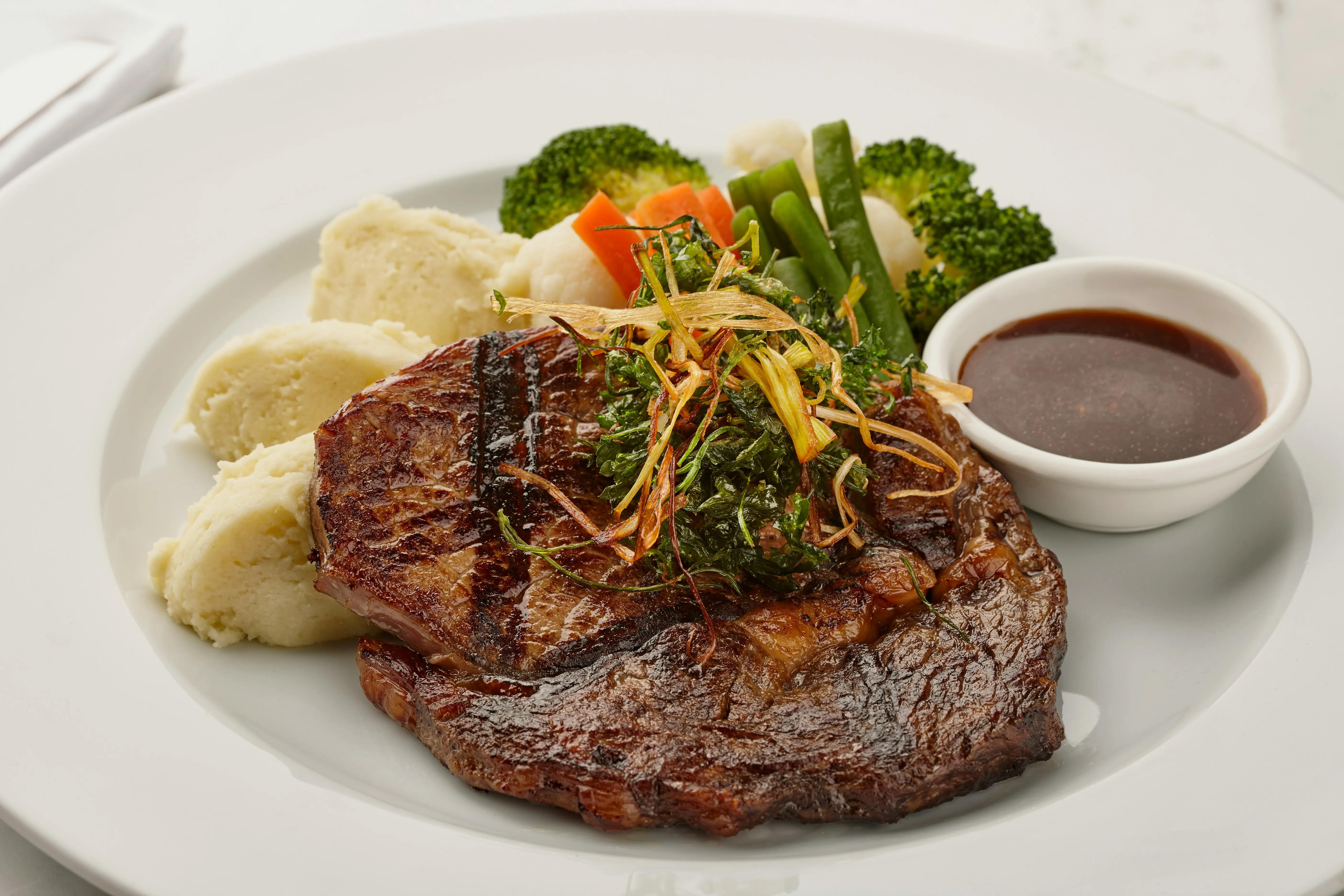 A plate with meat and vegies