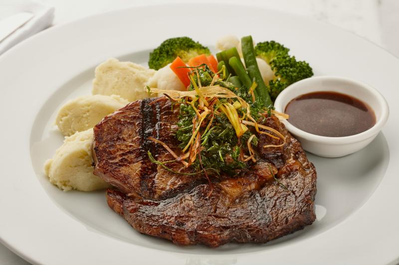 A plate with meat and vegies