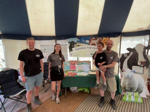 The team and their stall at Glastonbury.