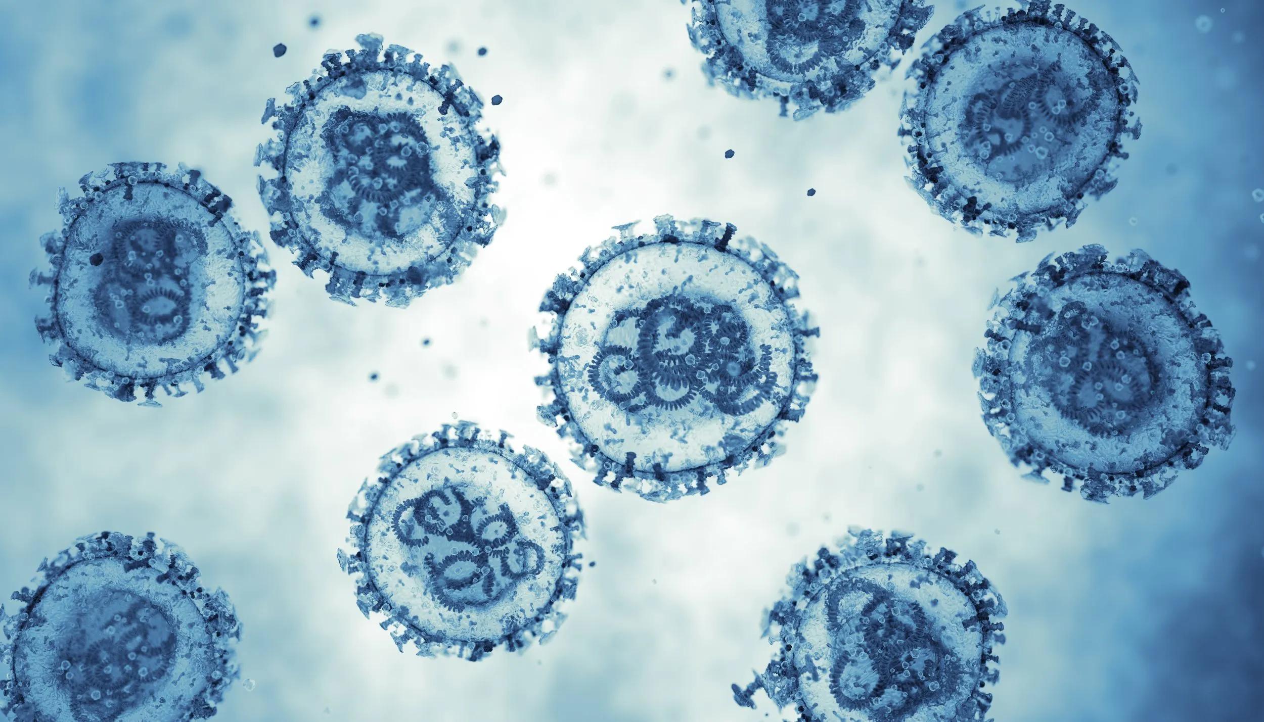 A microscopic image of a virus, showing virions in blue