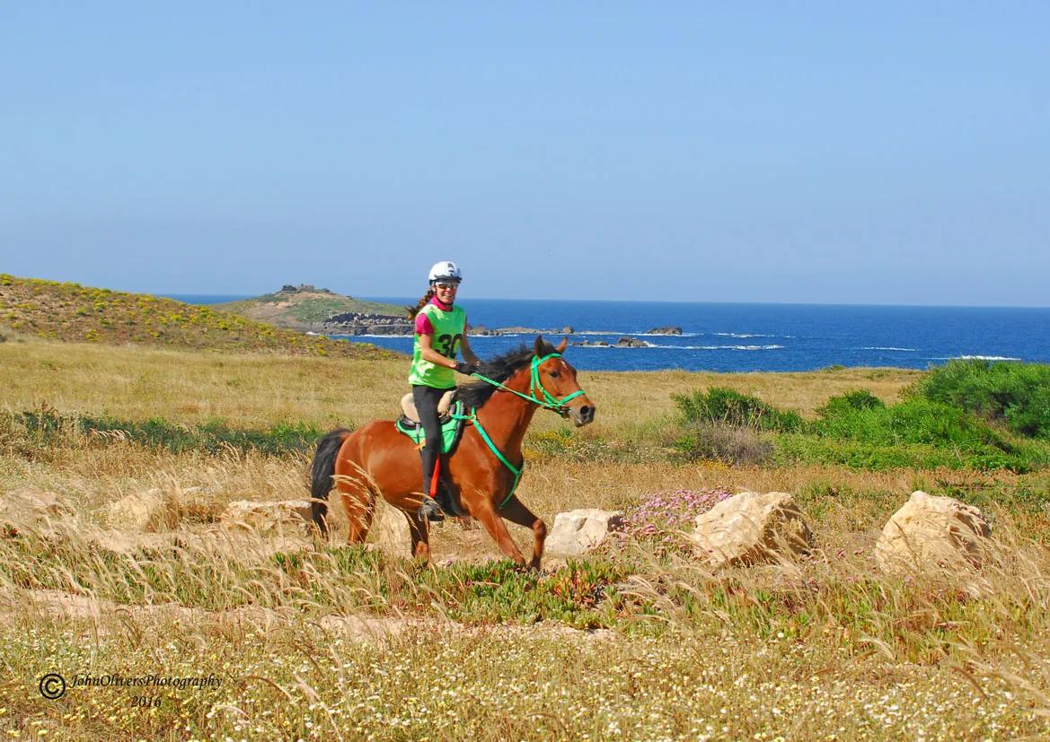 Sylvia Read riding a horse.