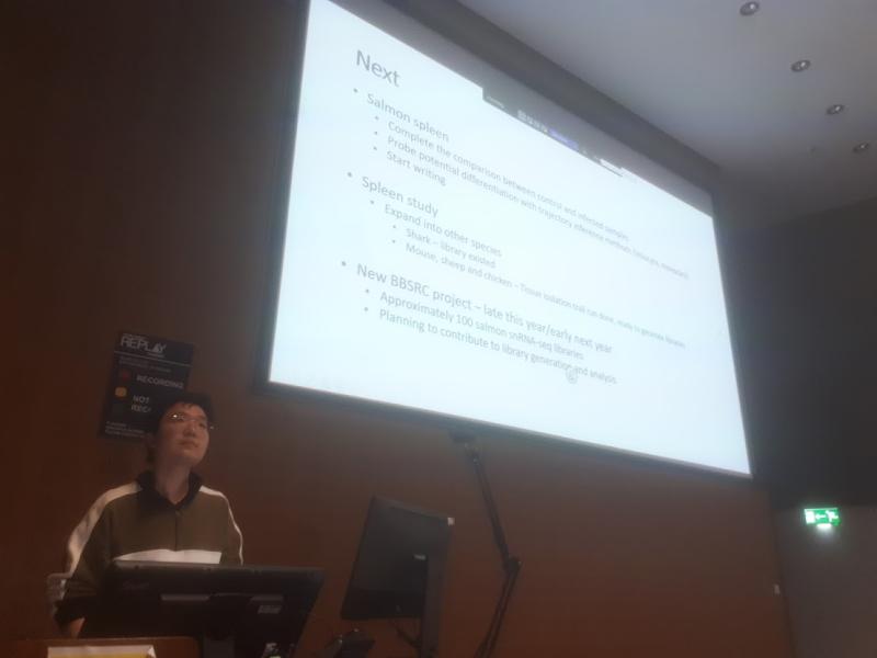 Jianxuan Sun explains the intricacies of single-cell sequencing to the rest of the team.