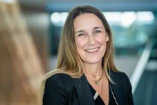 Lisa Boden indoors smiling