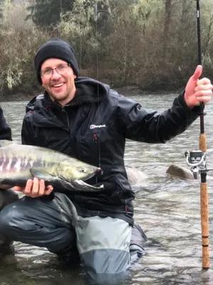 Dan holding a fish he just caught