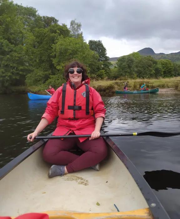 Clemence on a canoe