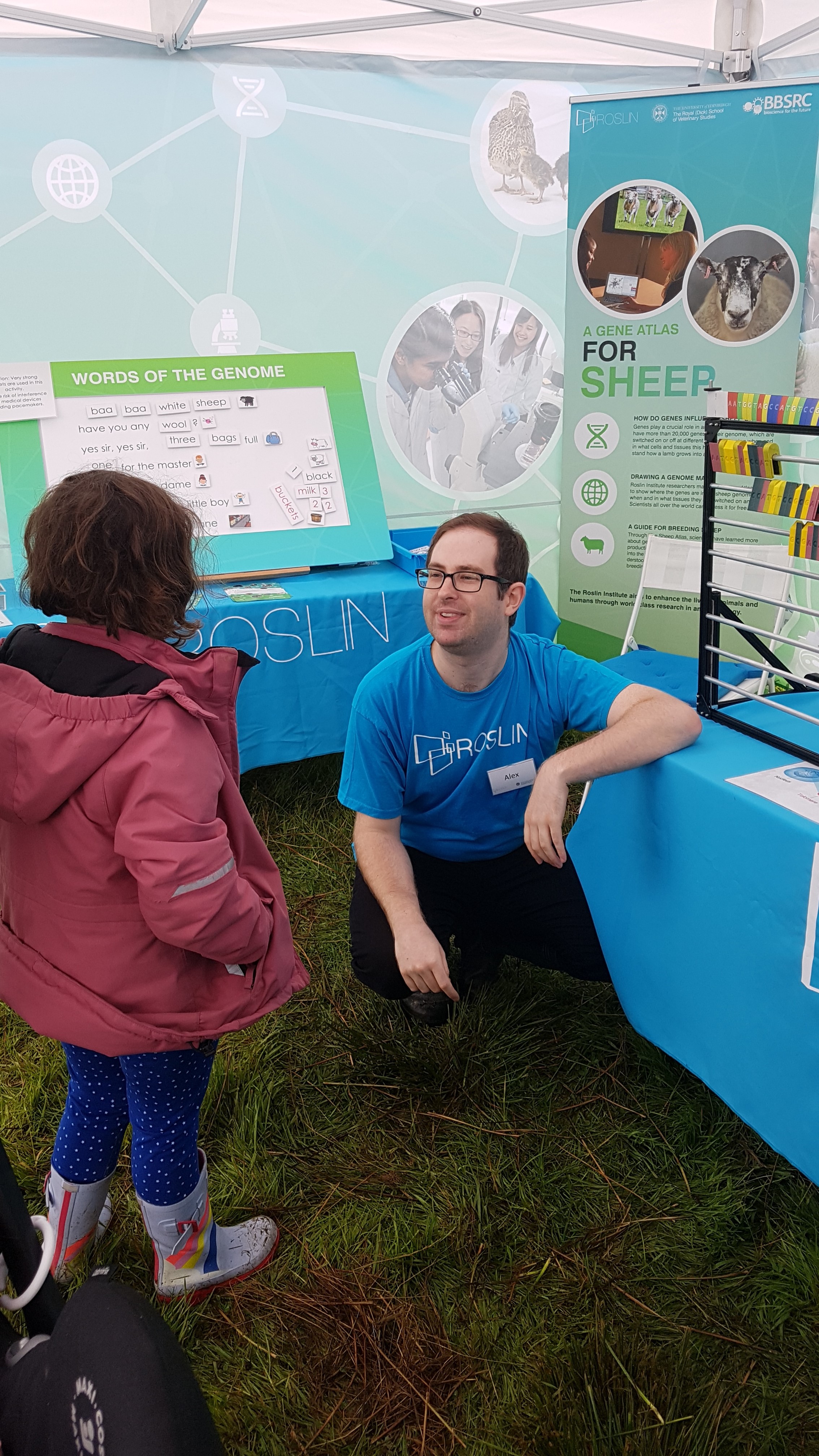 Alex Brown talks to a girl about genetics at the Mid-Argyll Show