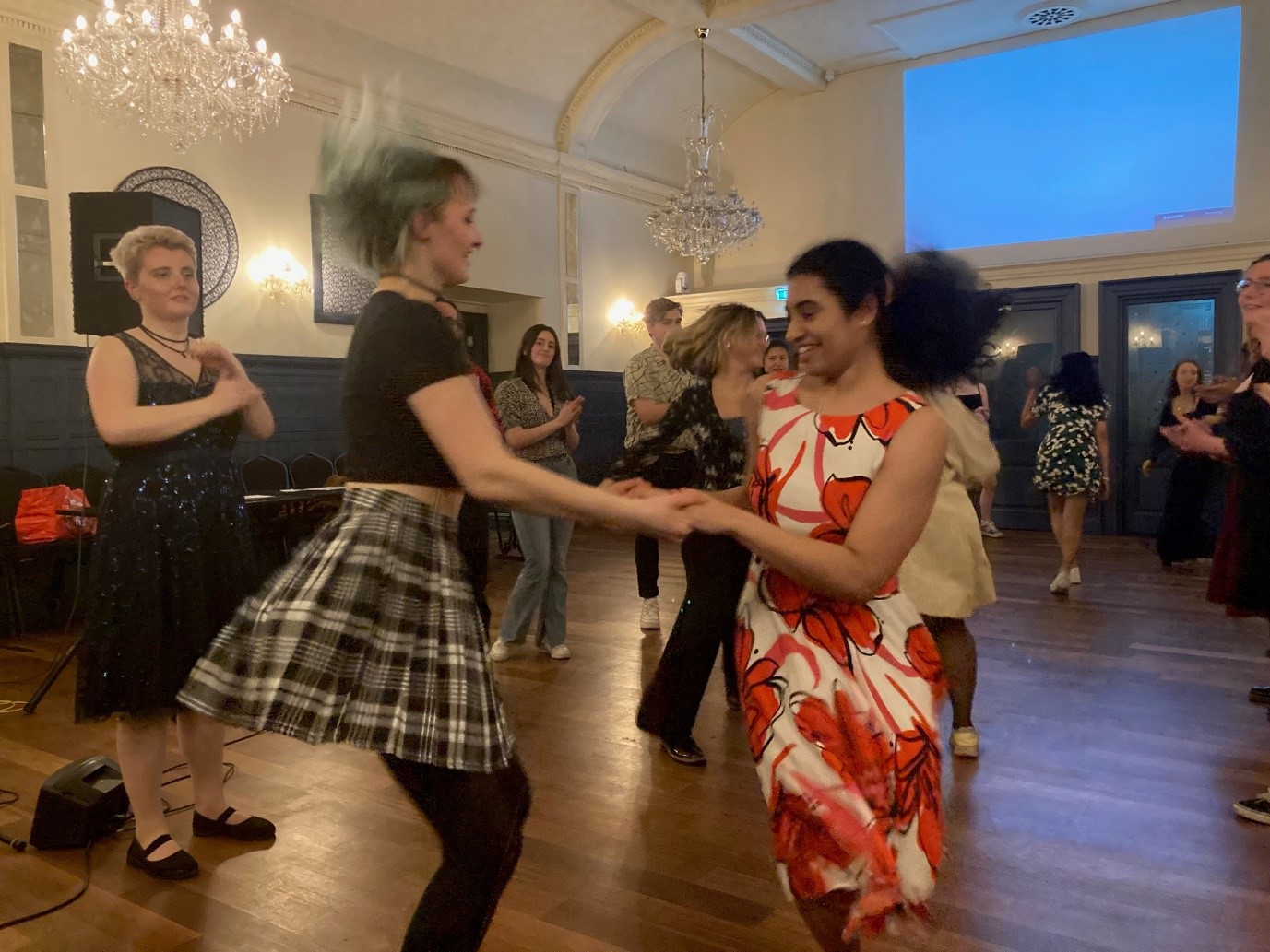 People dancing at the All4Paws ceilidh event.