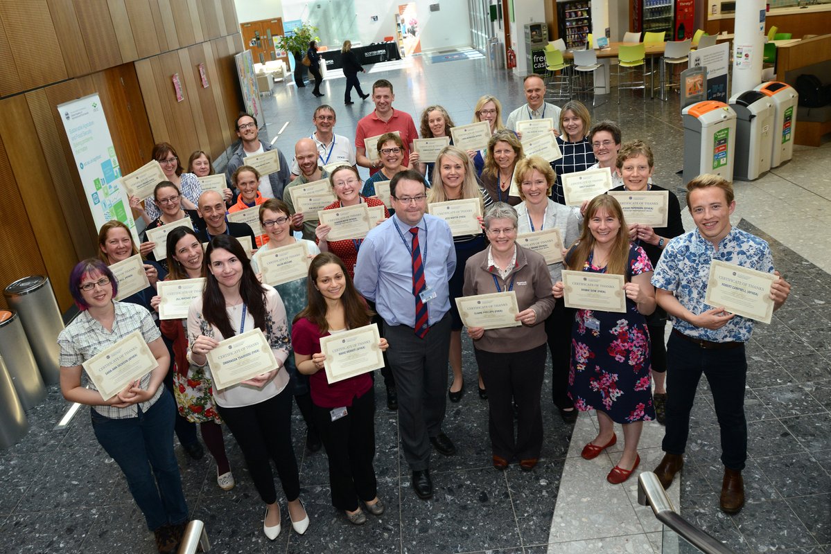 staff and students with their awards