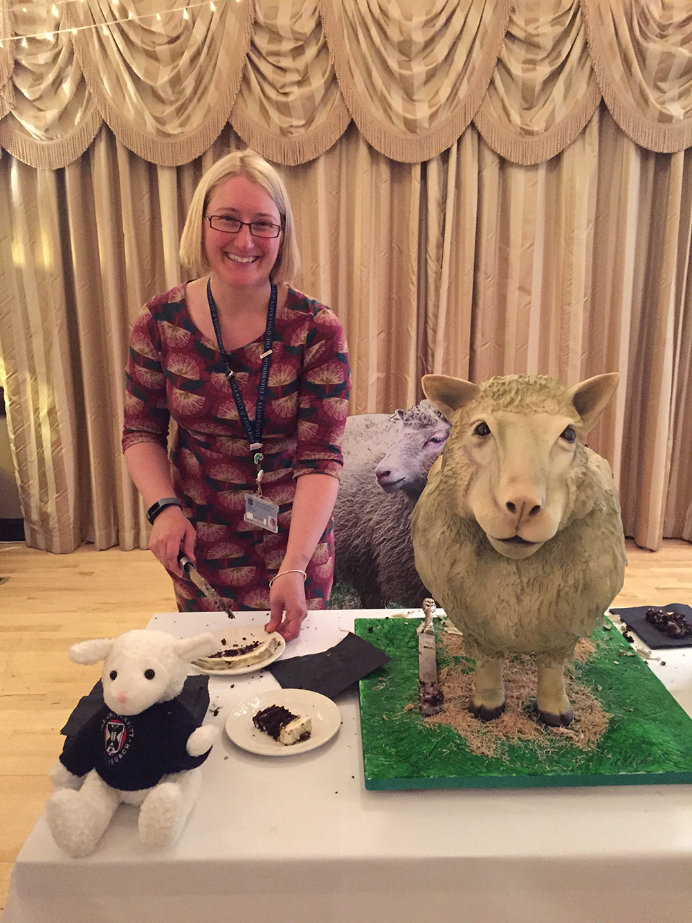 Nicola Stock cutting slices of Dolly-shaped cake