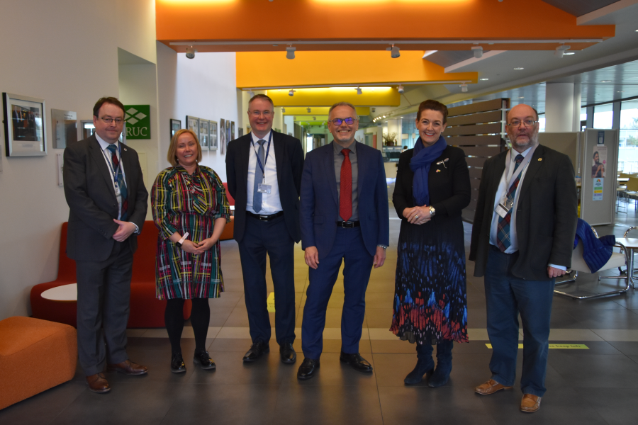 Minister Jo Churchill and Easter Bush hosts posing at the Roslin Institute