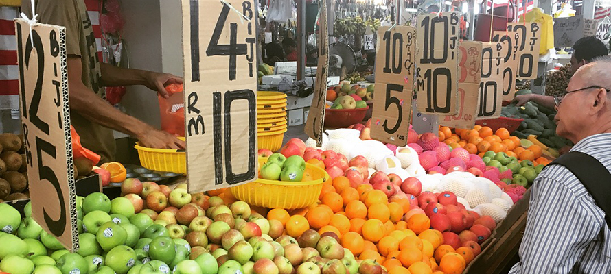 Customers browse an Asian food market