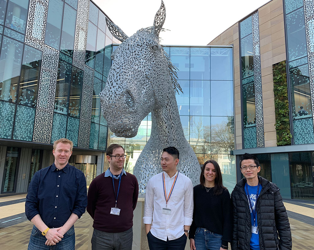 Dr Finn Grey (left) with his research group at Easter Bush campus