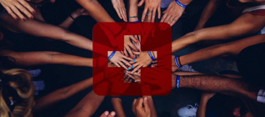 group of people reaching out to hold hands 