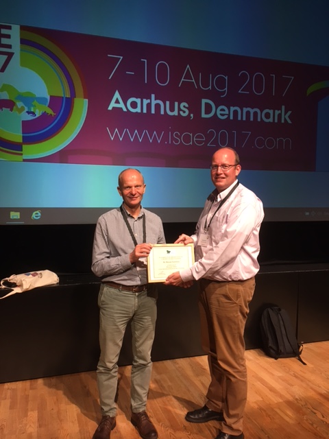 Professor Lawrence receiving the award from Dr Bas Rodenburg, President of ISAE.